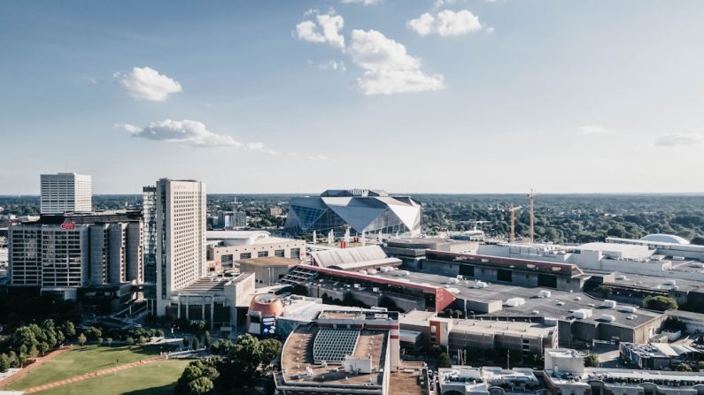 Mercedes-Benz Stadium - an aerial view of a city with tall buildings