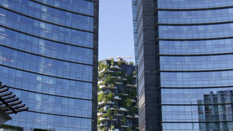 Vertical Forest - a couple of tall buildings sitting next to each other